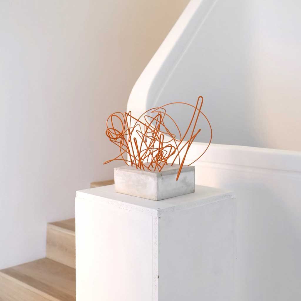 escultura naranja romel mumit